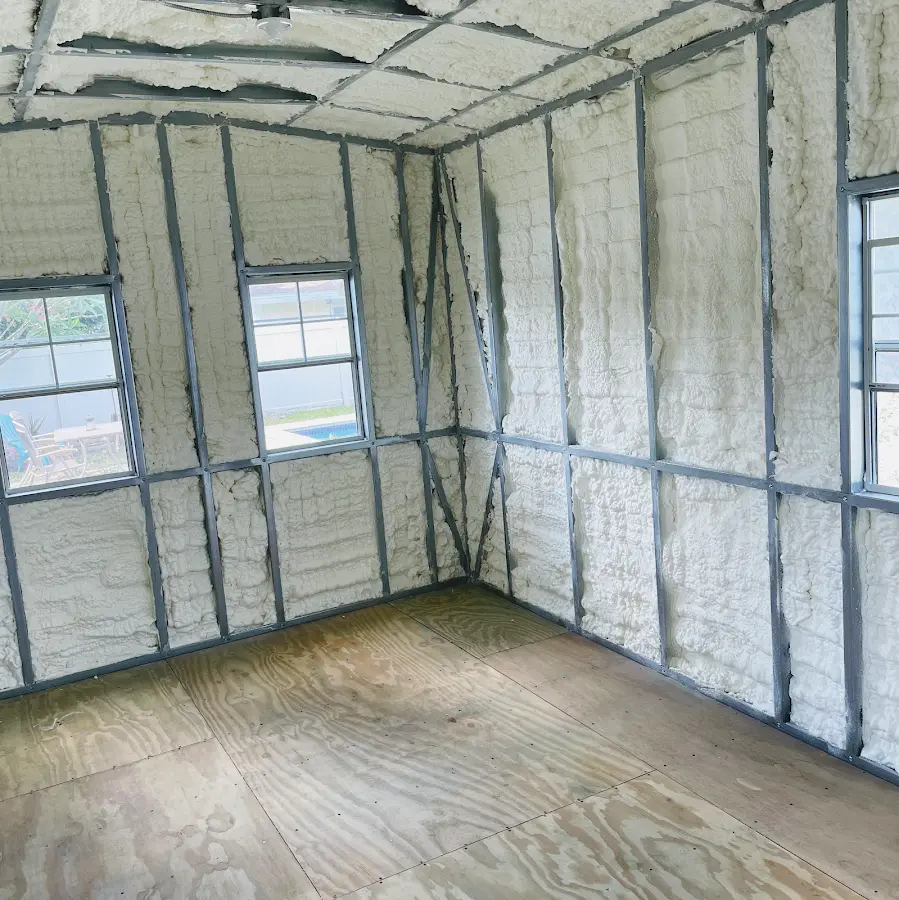 Closed-cell spray foam insulation applied to wall cavities in a residential project in Bexley